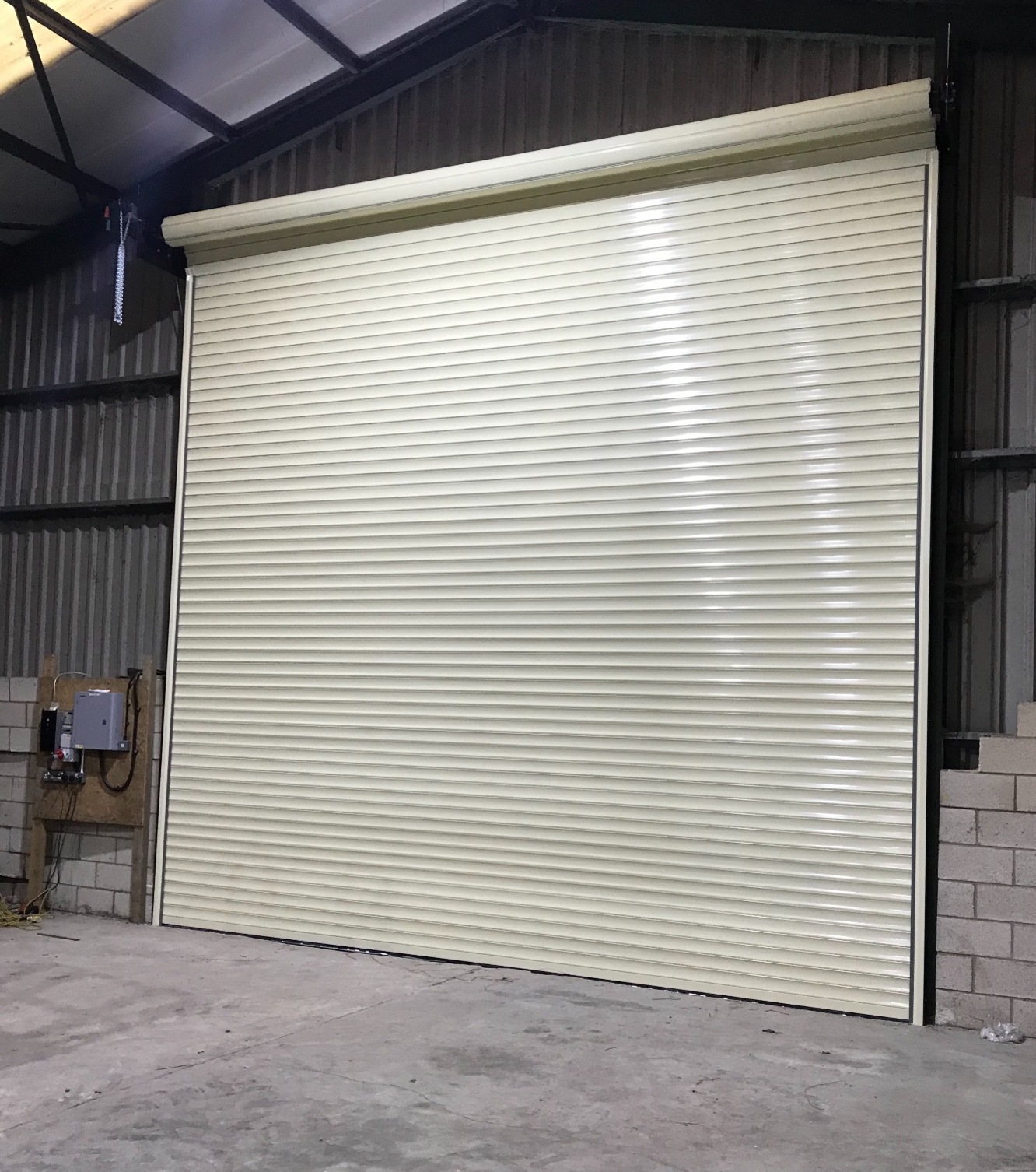 Insulated cream white roller shutter warehouse door